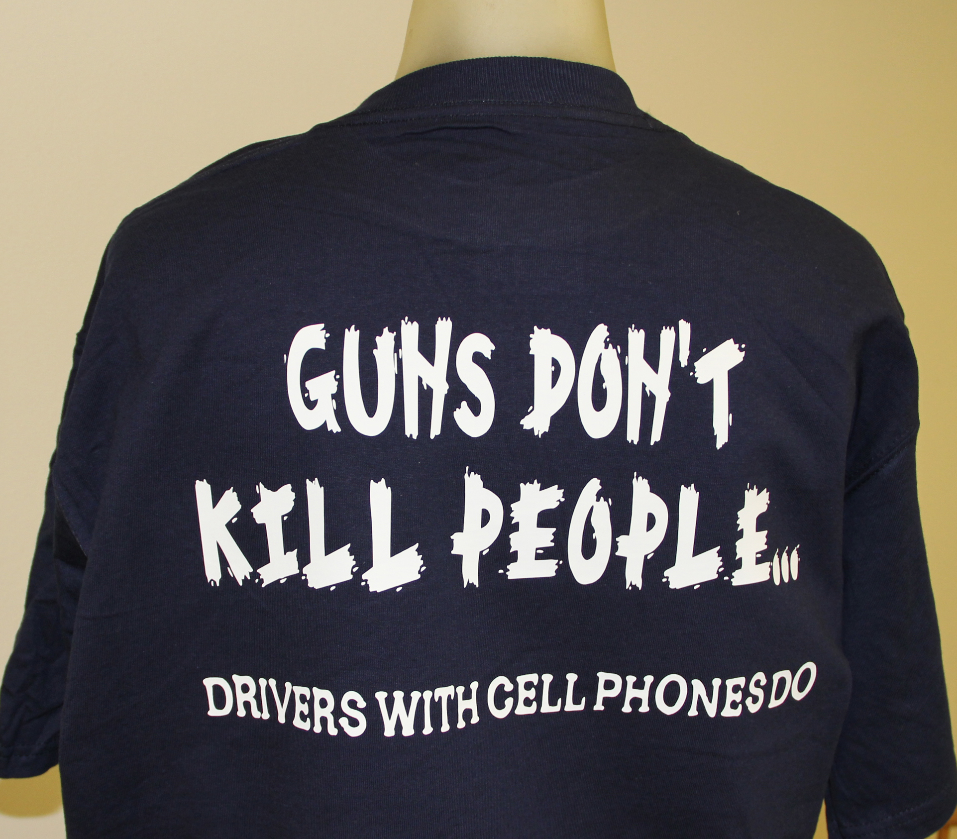 guns-dont-kill-people-drivers-with-cell-phones-do-shirt.jpg